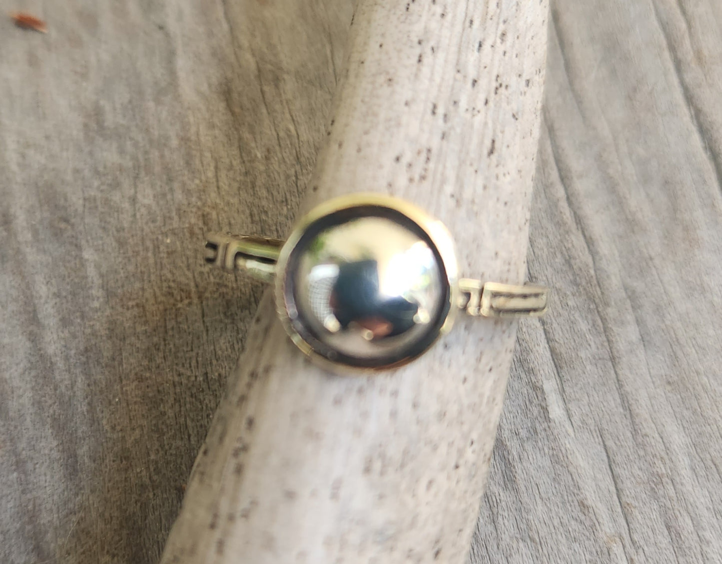 Two tone pinkie ring,9k gold with a sterling silver dome.