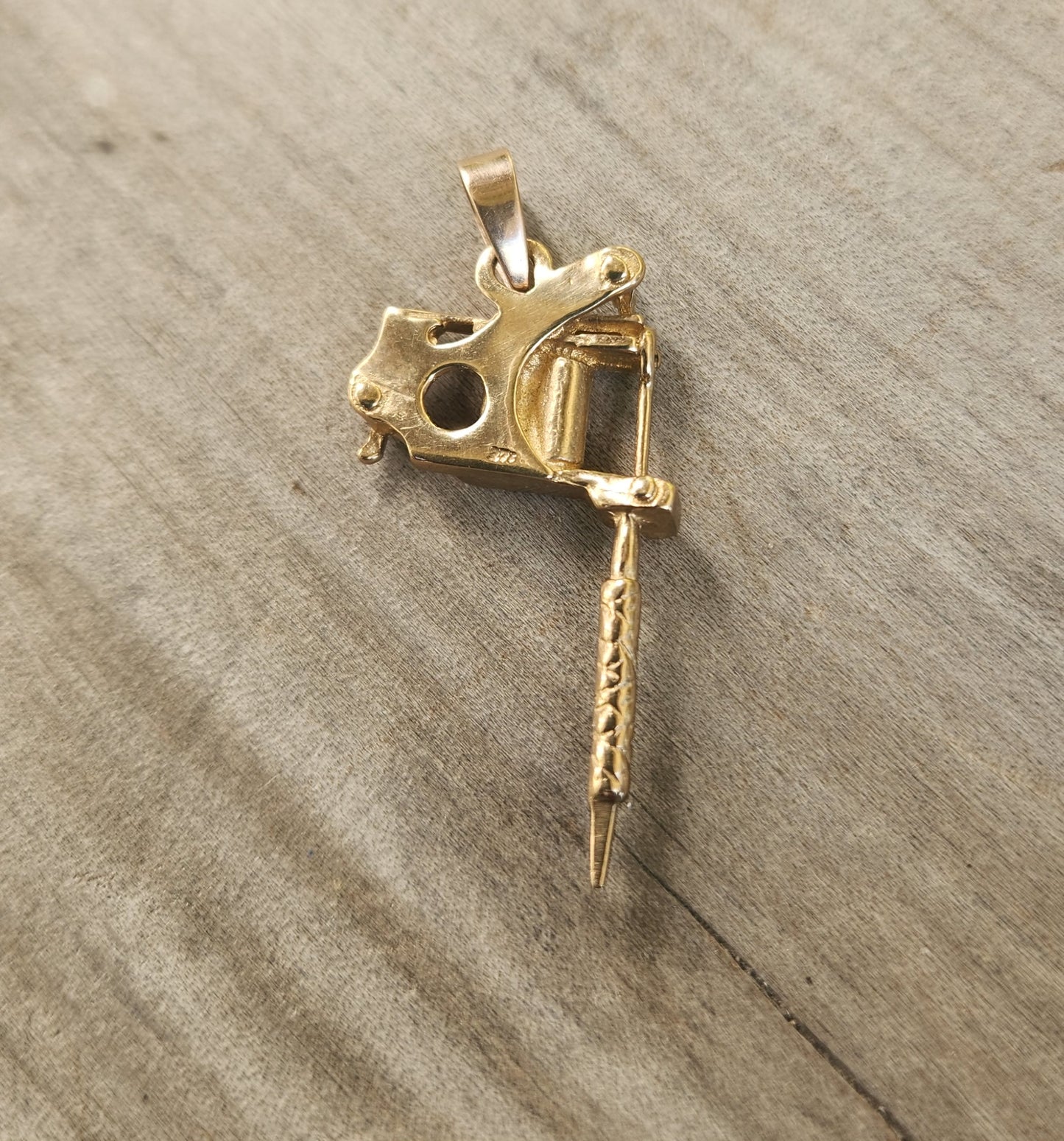 Gold tattoo gun pendant, solid 9k gold,9ct tattoo gun long pendant.