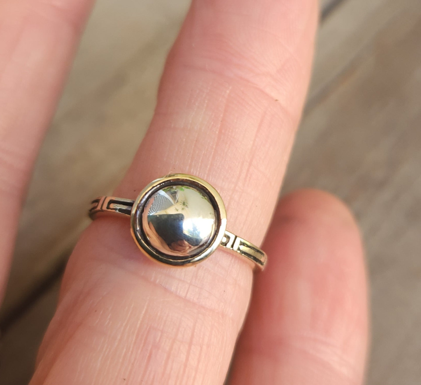 Two tone pinkie ring,9k gold with a sterling silver dome.