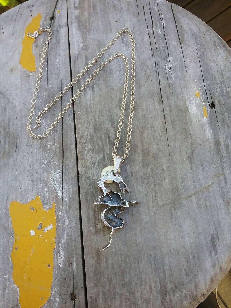 Dragon pendant,mythical sea serpent,sterling silver,naked lady,goddess on serpant,witch,new age