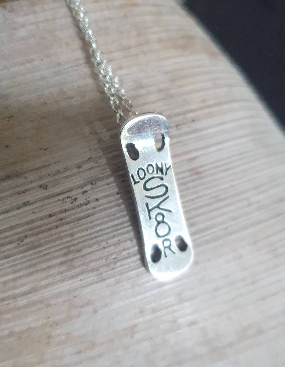 Skateboard pendant,sterling silver,Skater,Skater boarder,