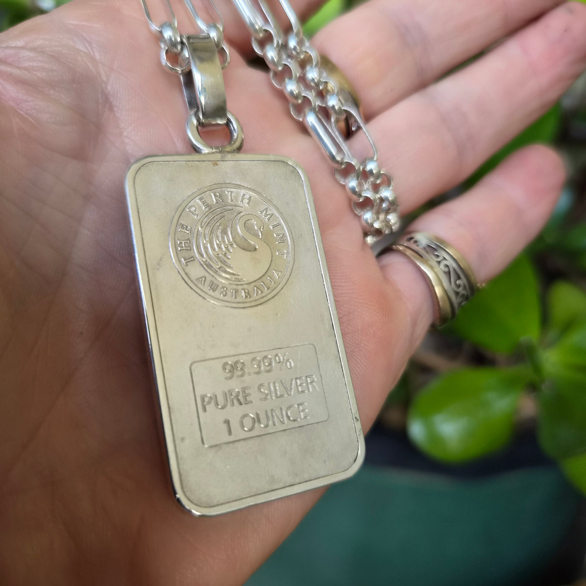 Dragon pendant,1 troy onze bullion bar.99.9 percent silver.Perth mint Australia