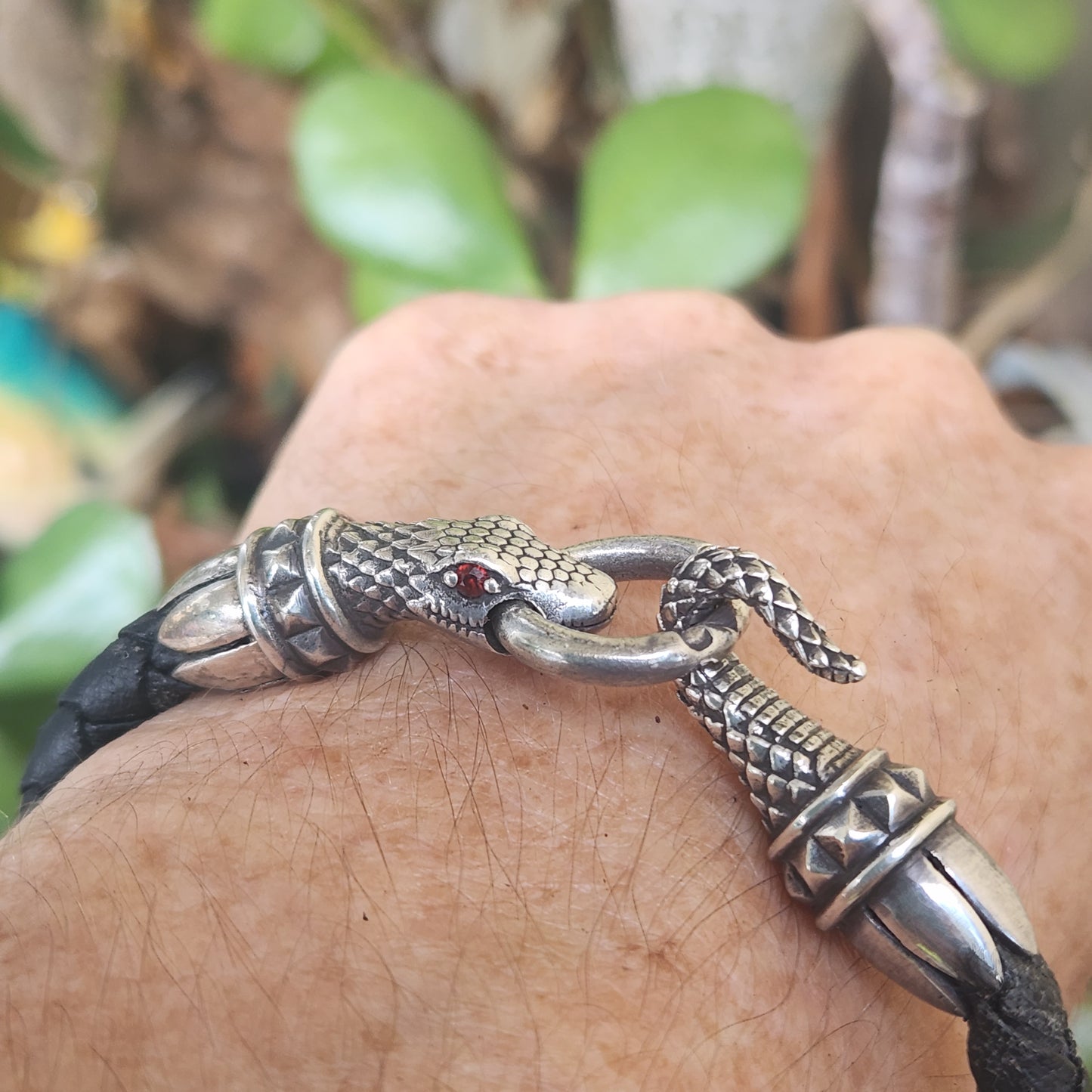 Silver snake and leather bracelet,925 sterling silver,22gms heavy solid,red eyes