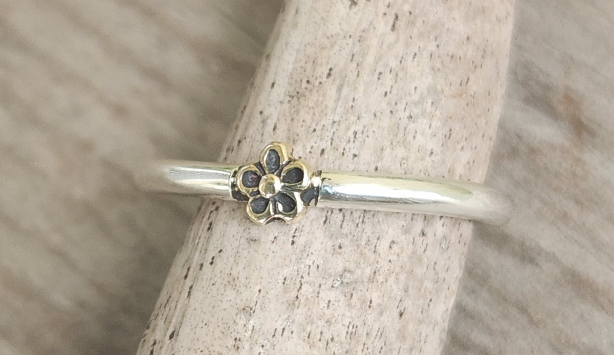 Two tone ring.9k gold flower on sterling silver band. Dainty mixed metal ring