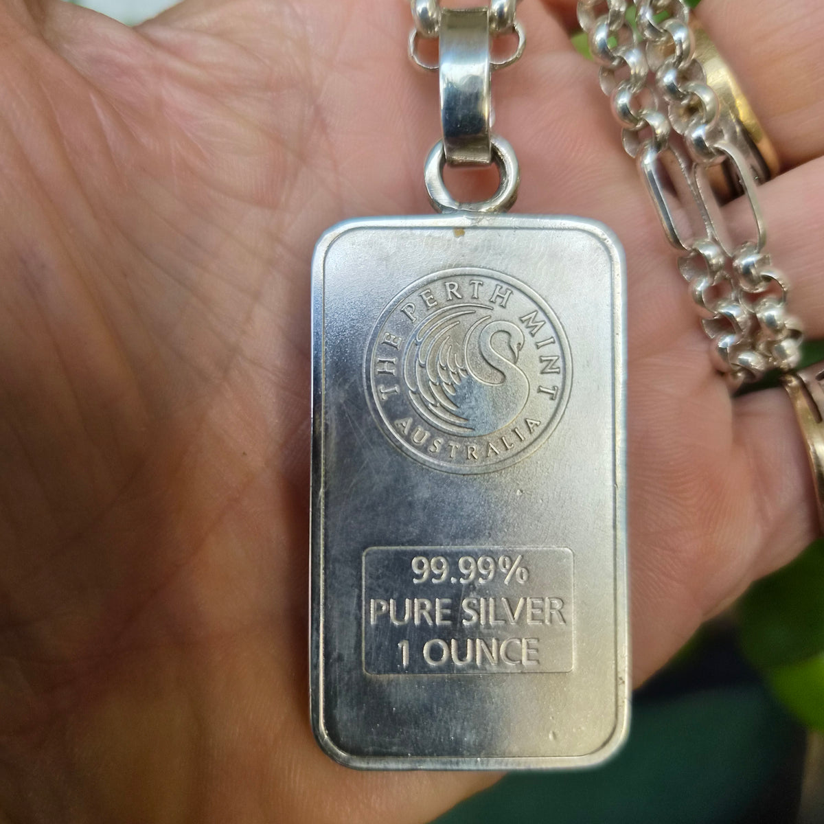 Dragon pendant,1 troy onze bullion bar.99.9 percent silver.Perth mint Australia