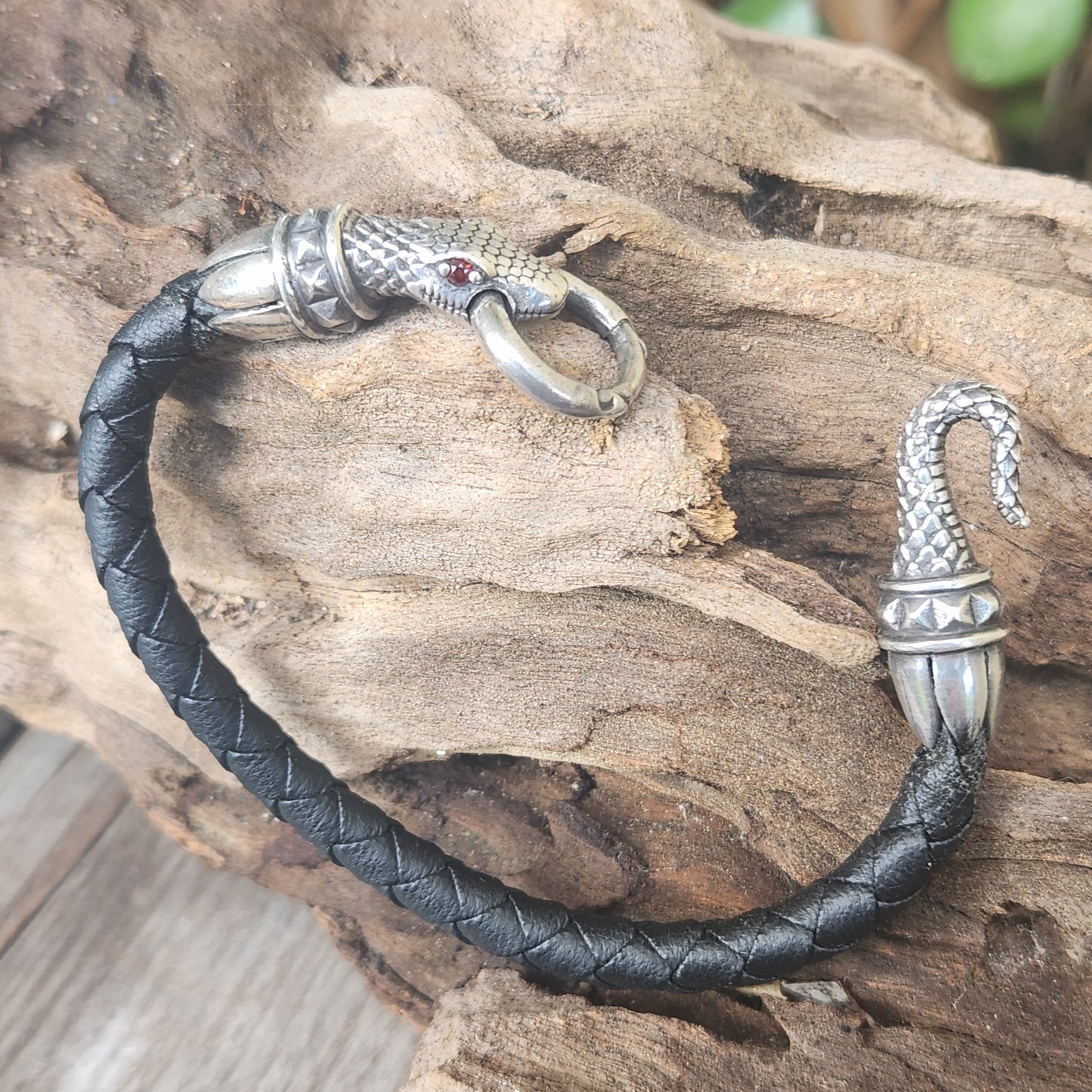 Silver snake and leather bracelet,925 sterling silver,22gms heavy solid,red eyes