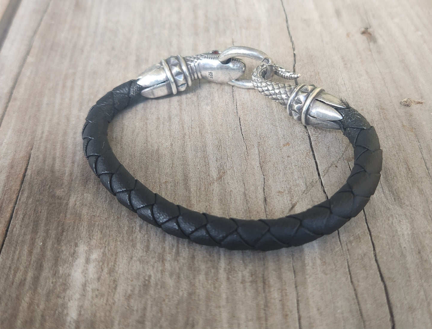 Silver snake and leather bracelet,925 sterling silver,22gms heavy solid,red eyes