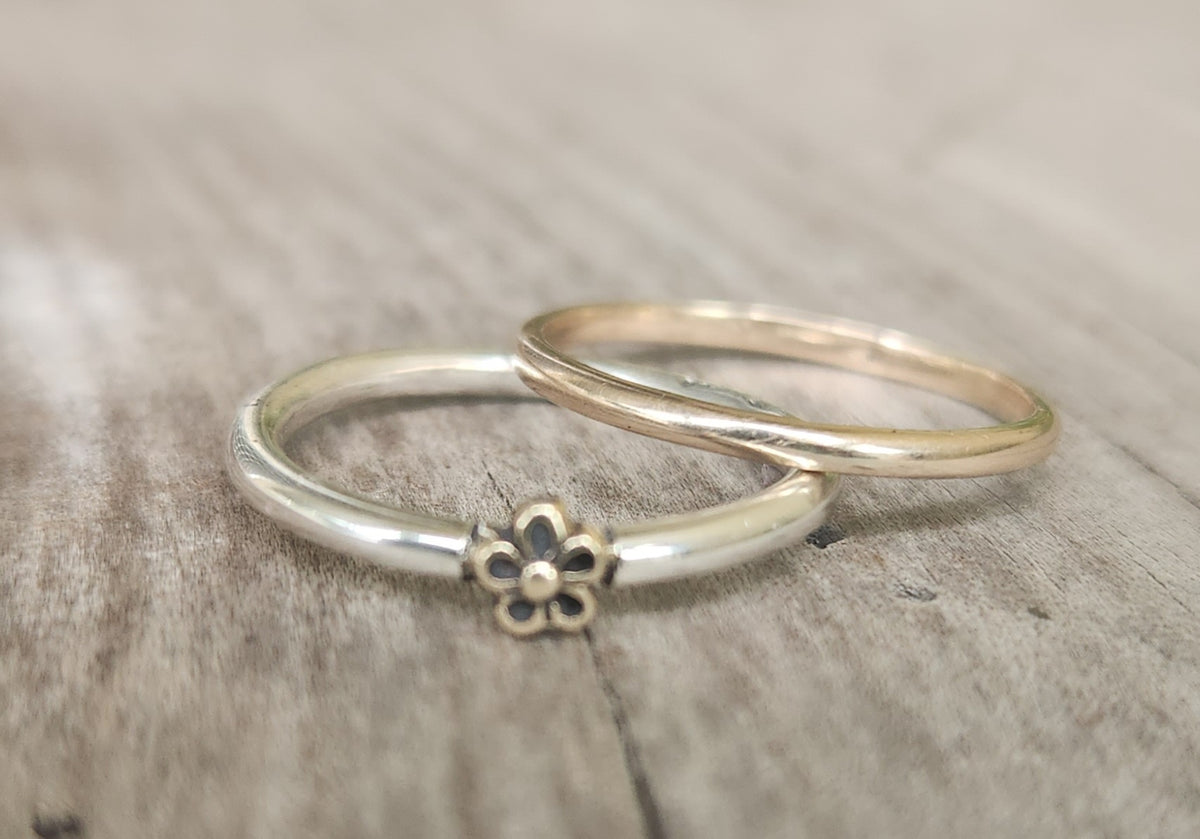 Two tone ring.9k gold flower on sterling silver band. Dainty mixed metal ring