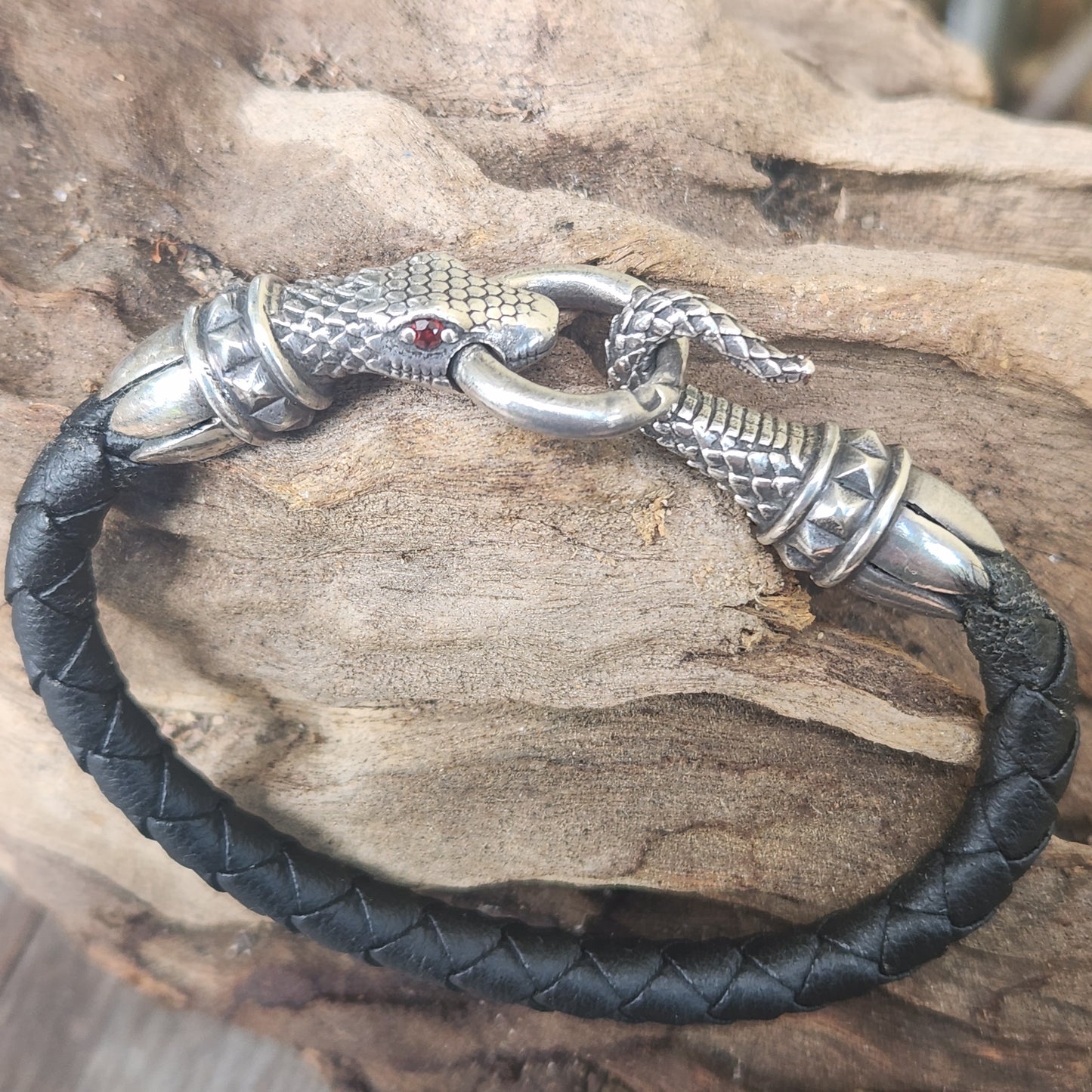 Silver snake and leather bracelet,925 sterling silver,22gms heavy solid,red eyes