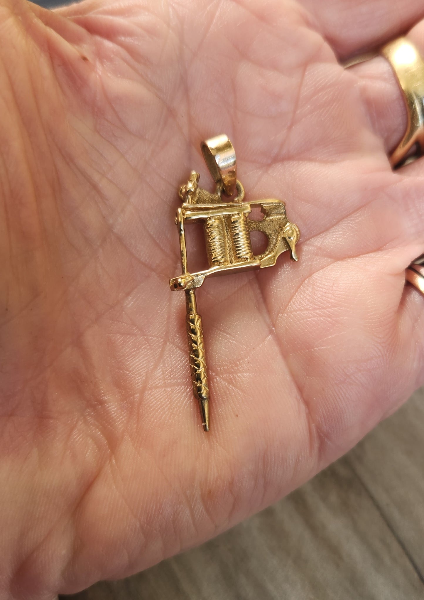 Gold tattoo gun pendant, solid 9k gold,9ct tattoo gun long pendant.