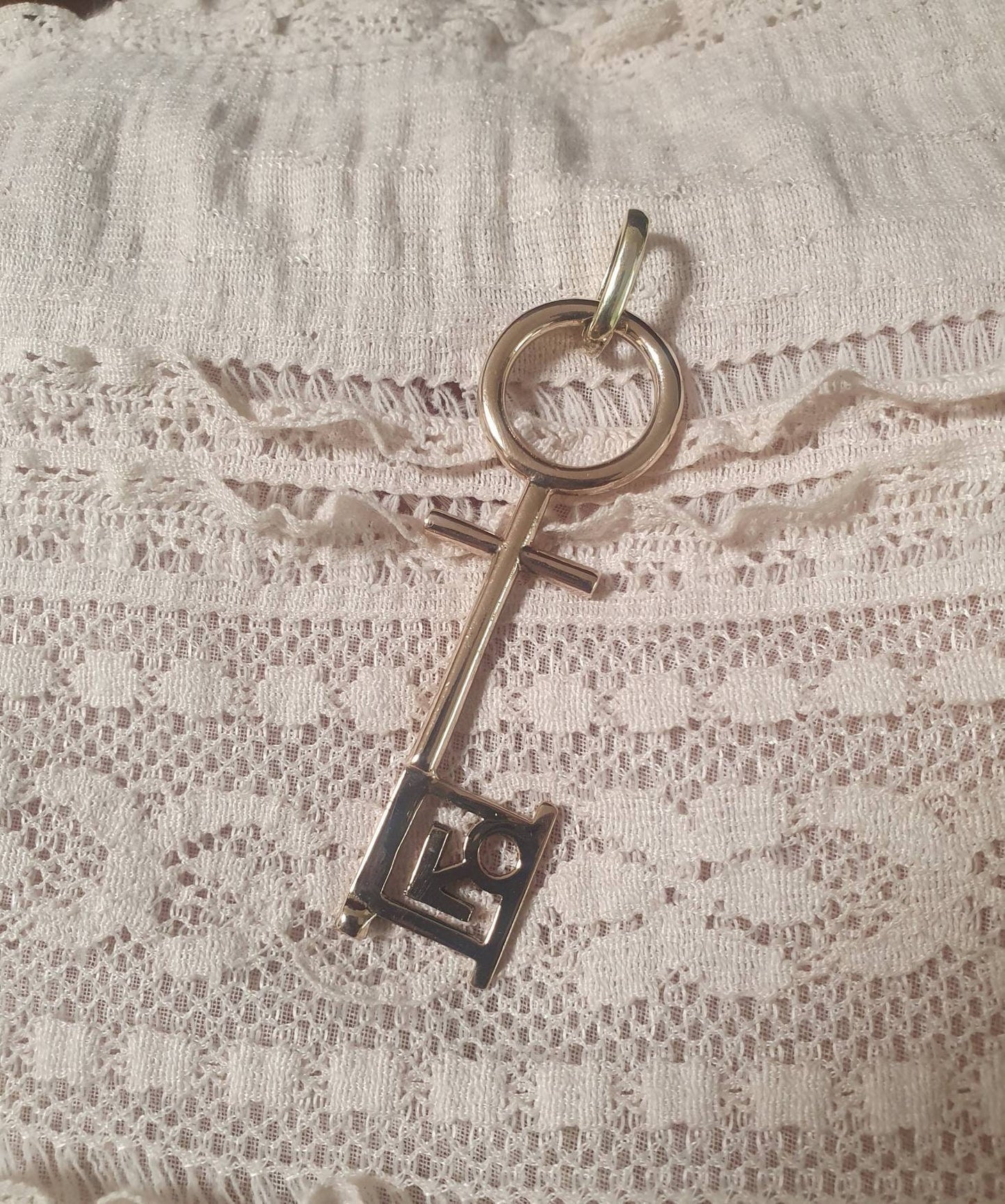 Penthouse pet key pendant,vintage,1990s,brass,gold colour