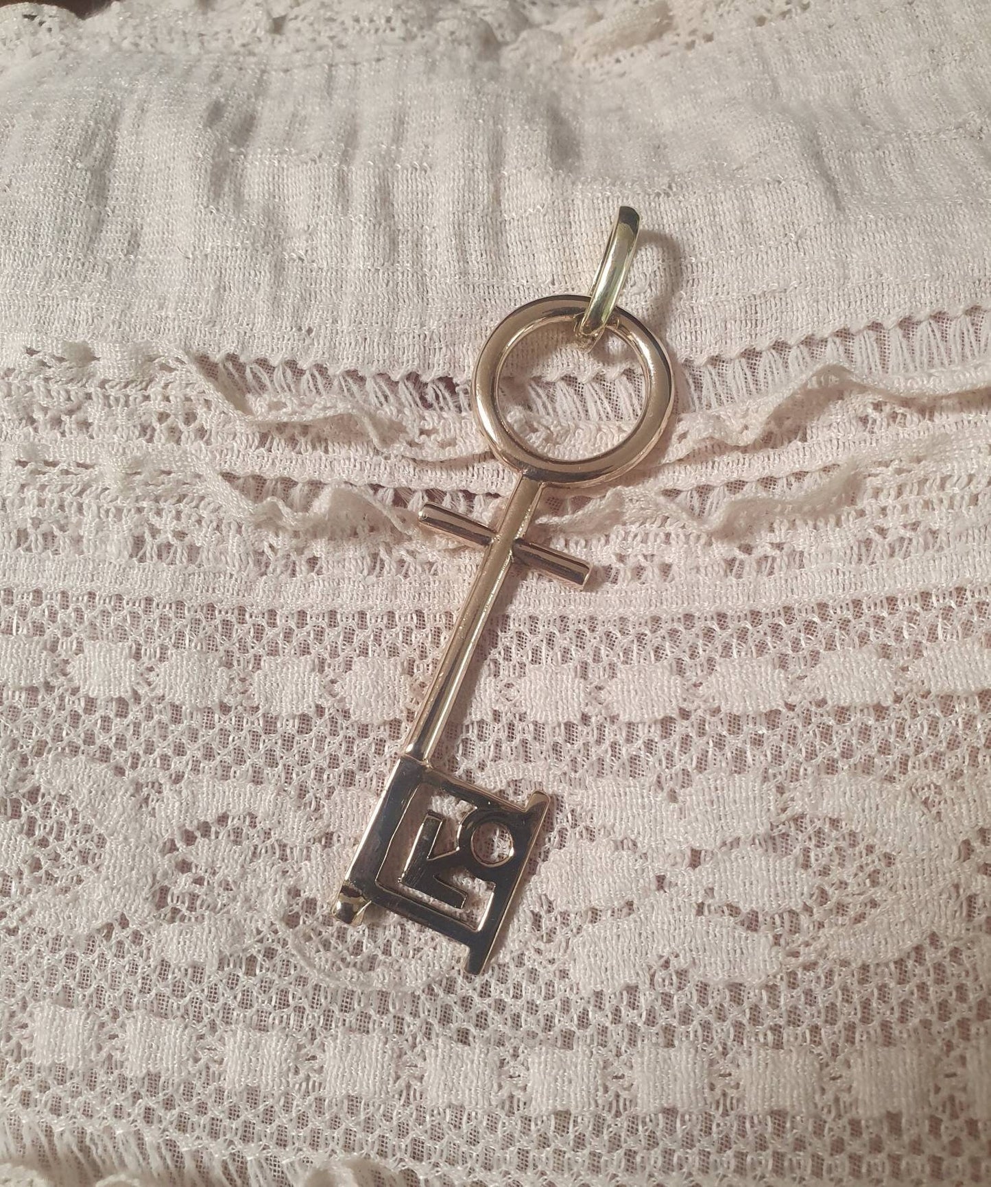 Penthouse pet key pendant,vintage,1990s,brass,gold colour