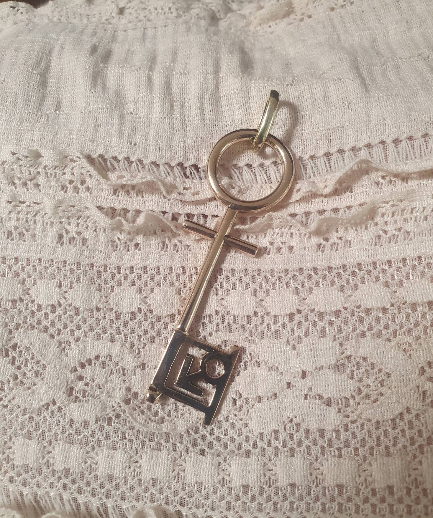 Penthouse pet key pendant,vintage,1990s,brass,gold colour
